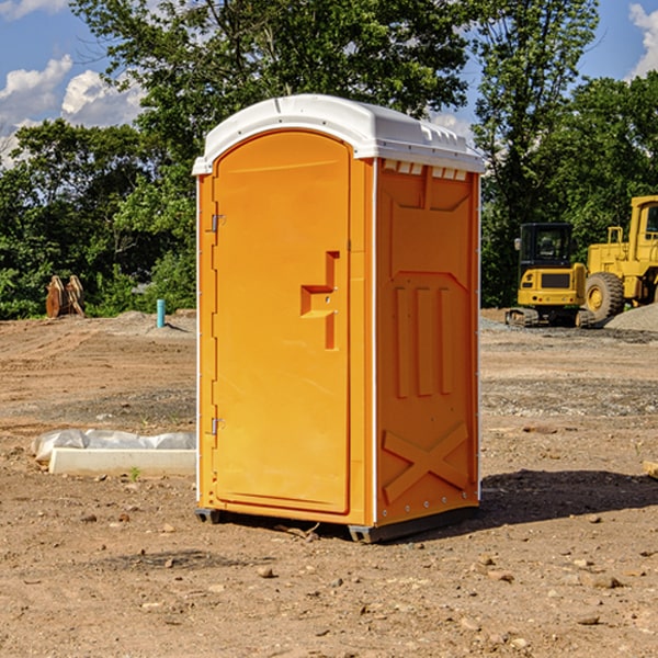 how often are the porta potties cleaned and serviced during a rental period in Hoisington